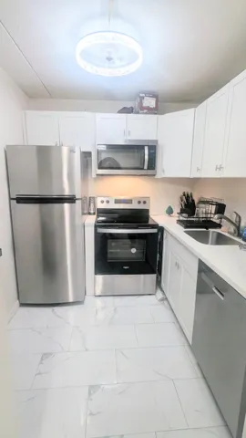 Renovated Kitchen w Stainless Appliances and Granite Countertops