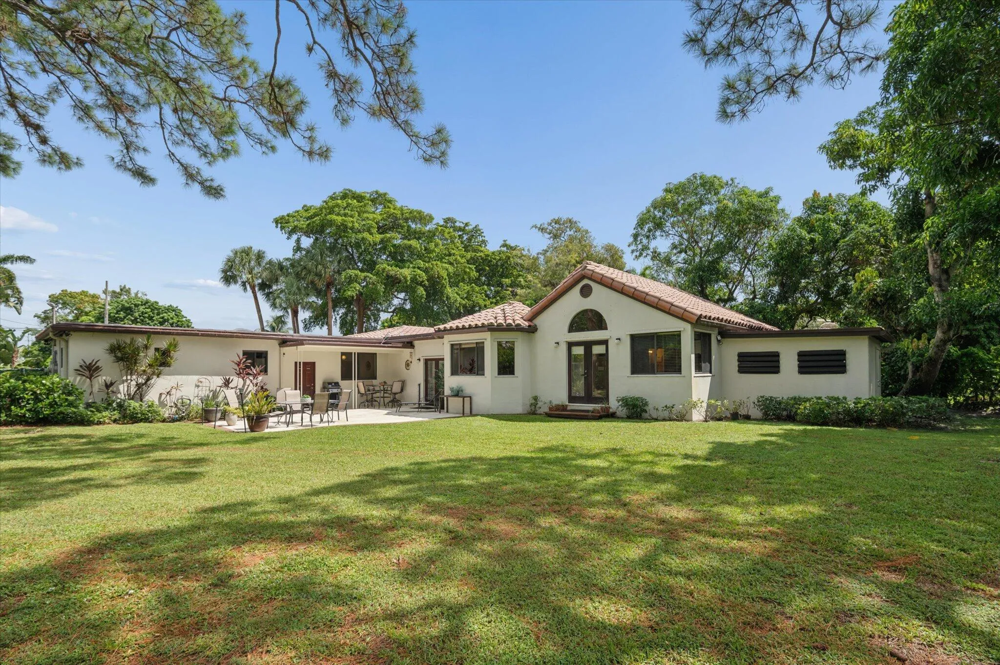 Back addition with 11' x 14' storage shed to far right--perfect to park the golf cart!