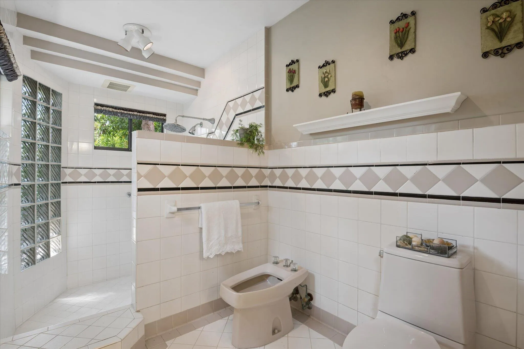 Ensuite bathroom in primary bedroom built in 1991.