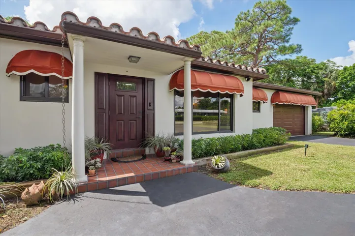 Entrance with hurricane-rated doors and windows