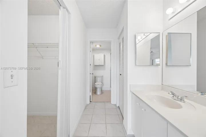Master Walk-In Closet and Master Bathroom