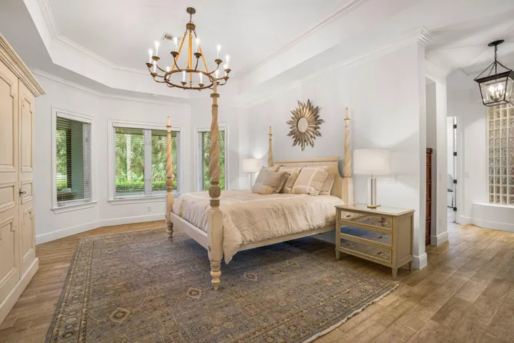 EXPANSIVE PRIMARY SUITE WITH SOARING CEILINGS
