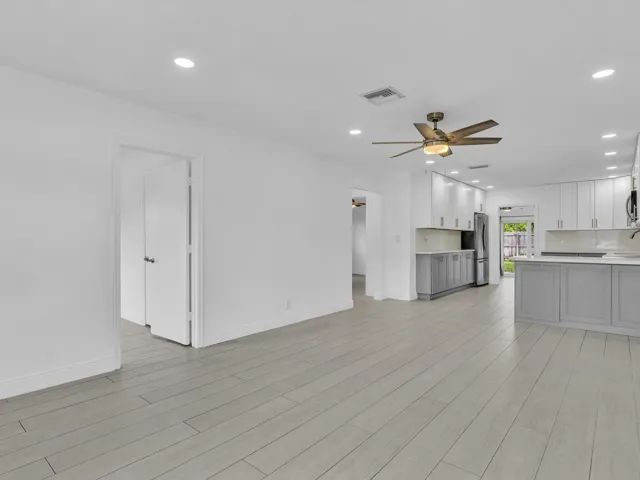 Wood-finish vinyl flooring throughout