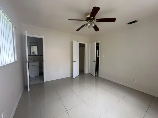 Primary bedroom with bathroom