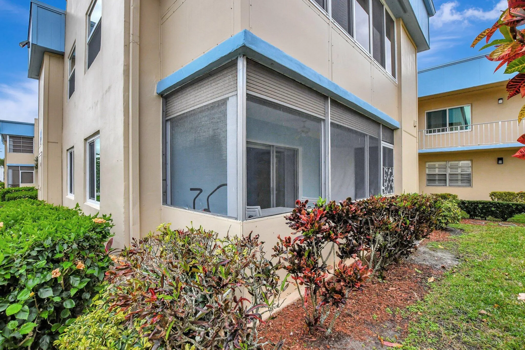 First floor, corner unit, impact windows