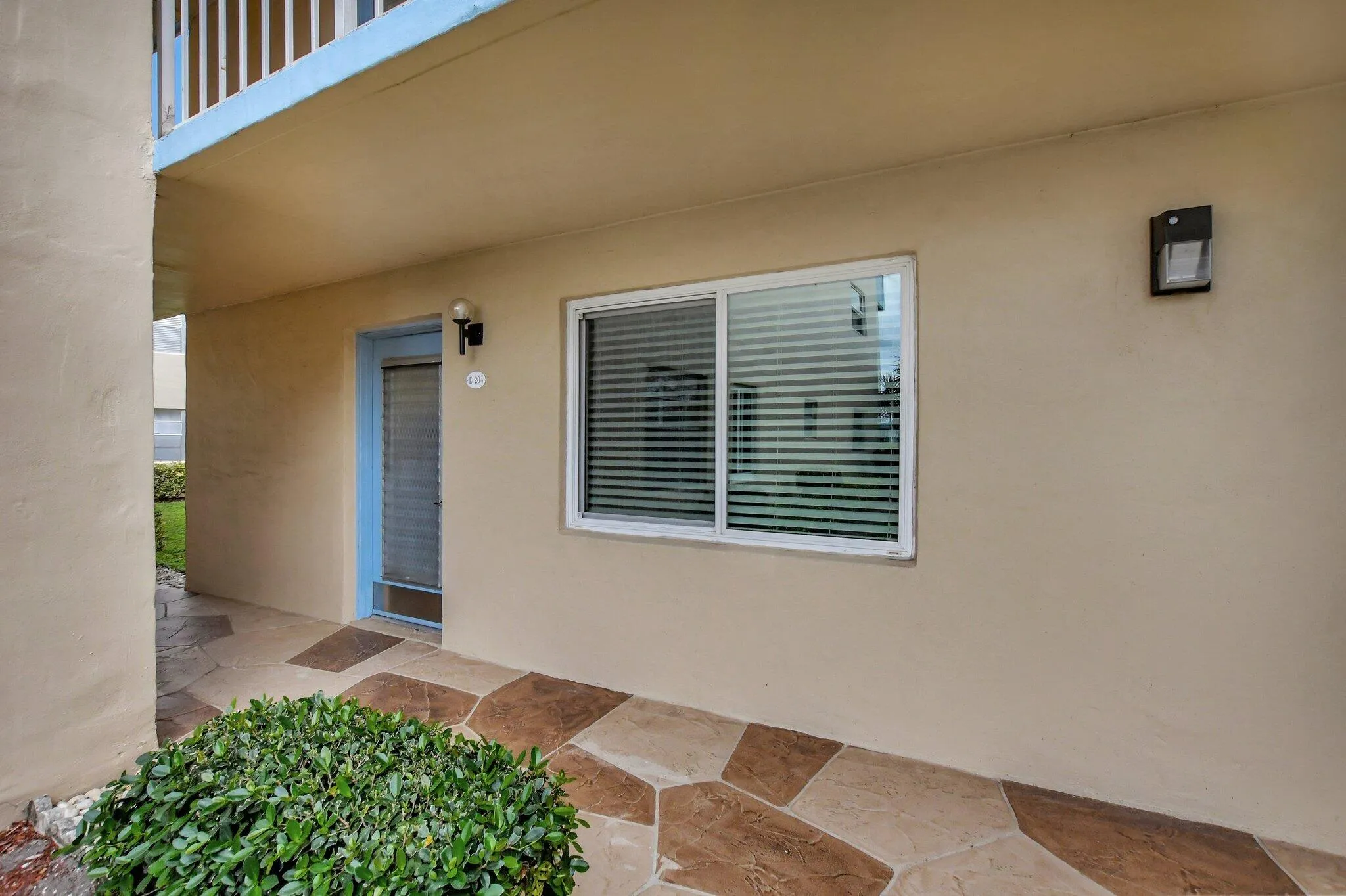 First floor, corner unit, impact windows