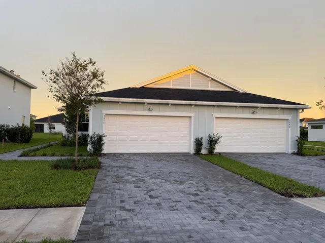 Two car garage + spacious Driveway
