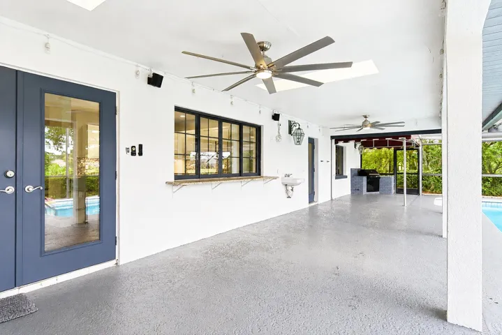 snack bar with pass thru window in kitch