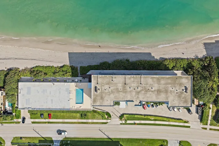 Coastal property with direct beach frontage, private swimming pool, and dedicated parking