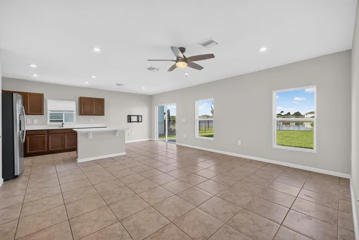 Open Floor Plan with Kitchen Island and Lake view