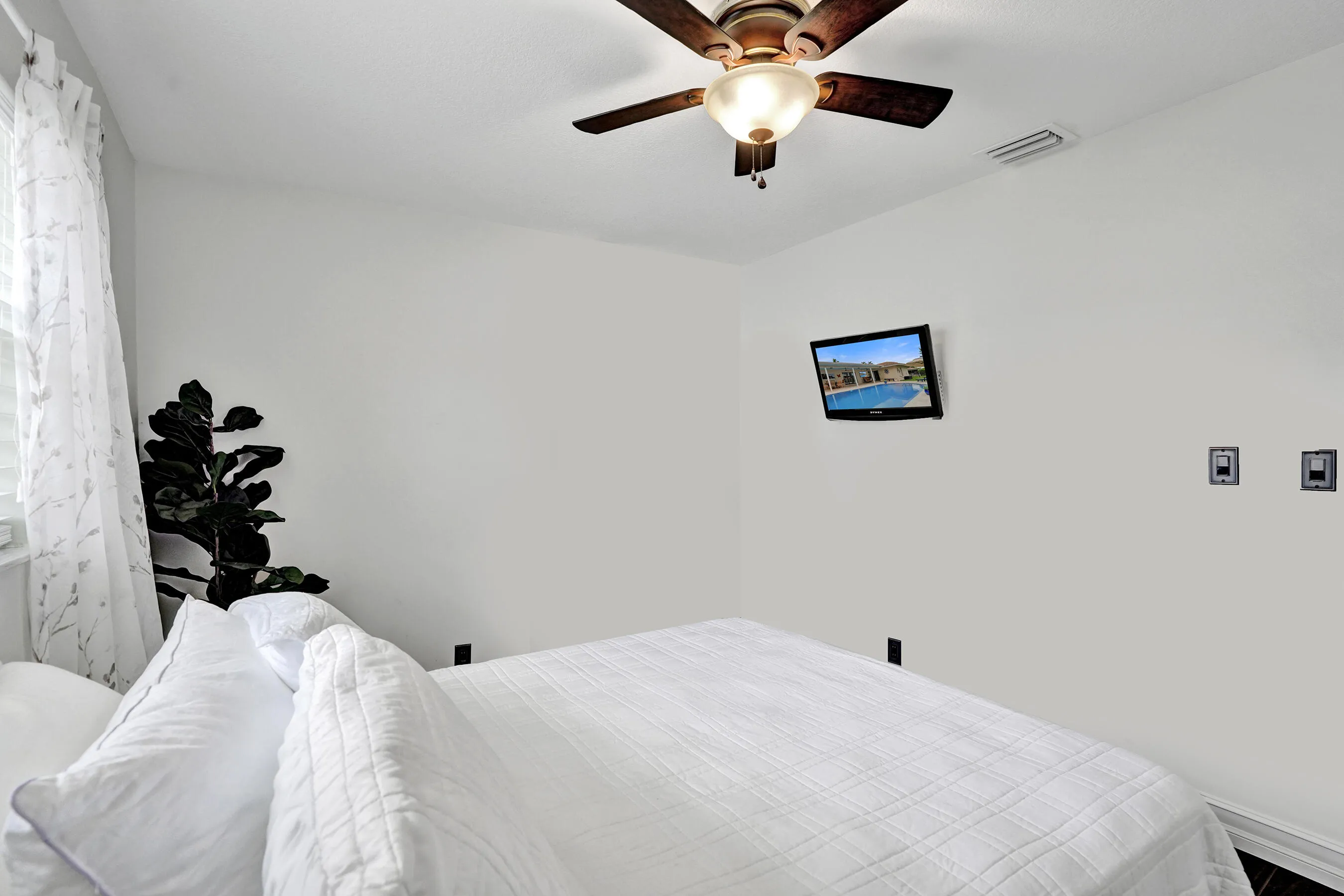 2nd bedroom- (safe digitally removed from photo)