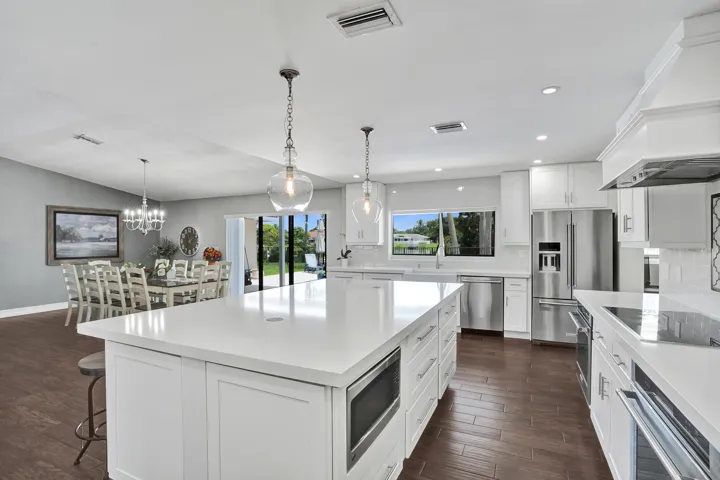 View of the pool and lake from kitchen