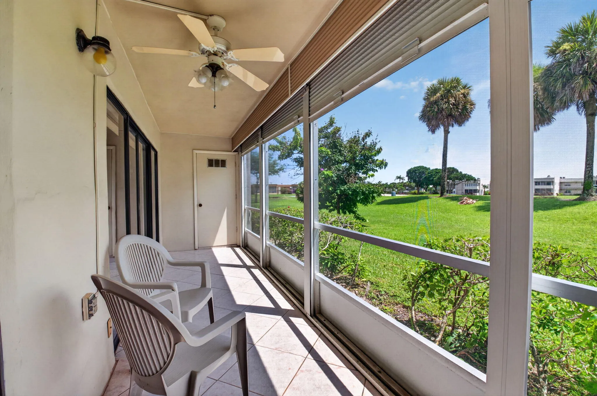 Screened Lanai w/ Roll Down Shutters