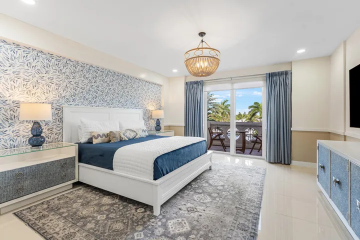 Beautifully decorated Primary suite with balcony access