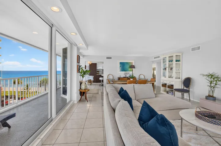 Spacious interior with tile flooring, recessed lighting, and a built-in display cabinet