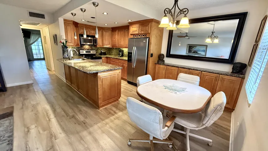 Kit + DIning Area ..