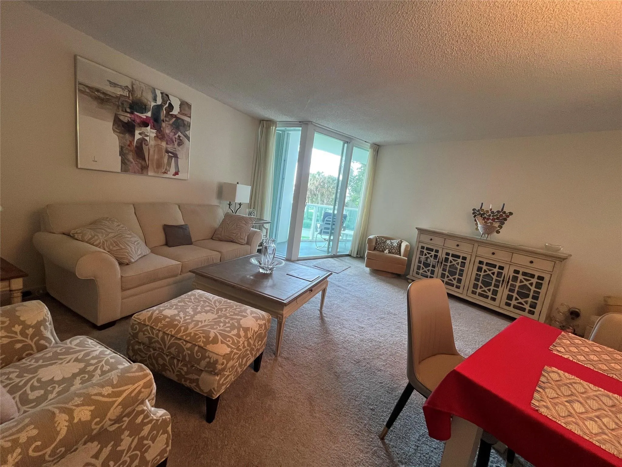 living room and sliders to balcony