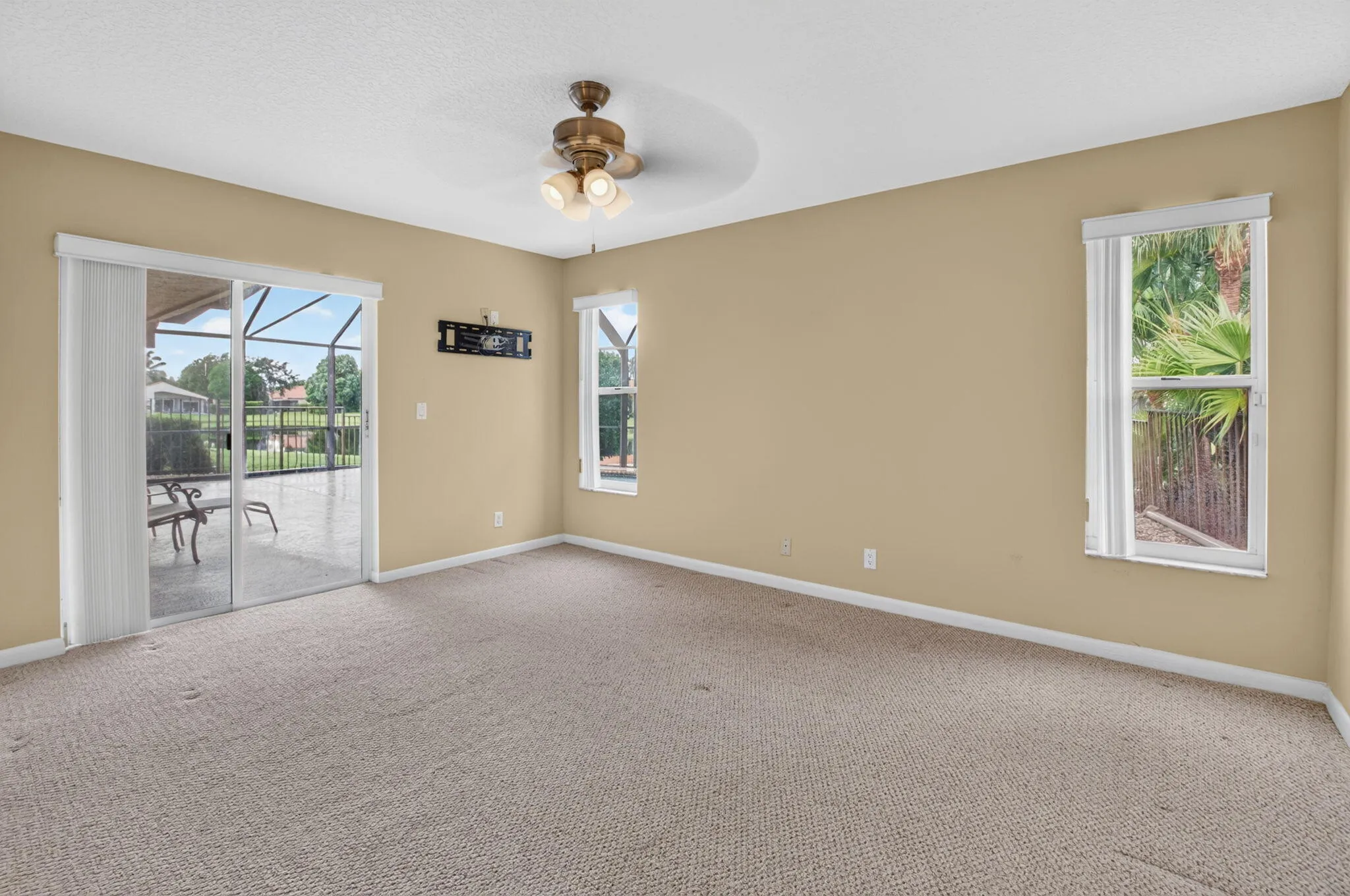 Master Bedroom with Berber Carpet & Ceiling Fan