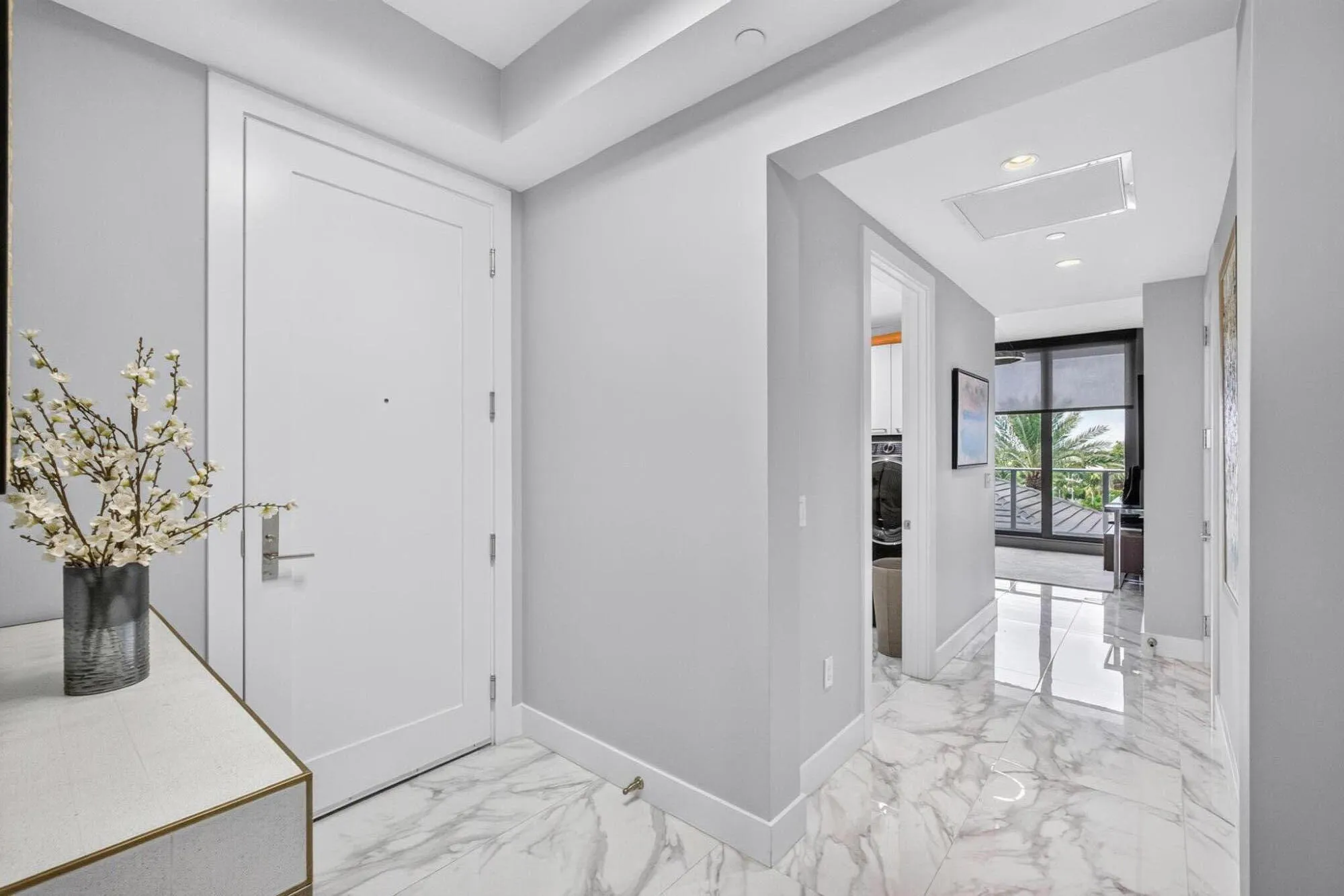 Your interior foyer, very bright with marble floors plenty of room to put down your keys, sunglasses, purse, or mail...lots of sunlight streams from every angle