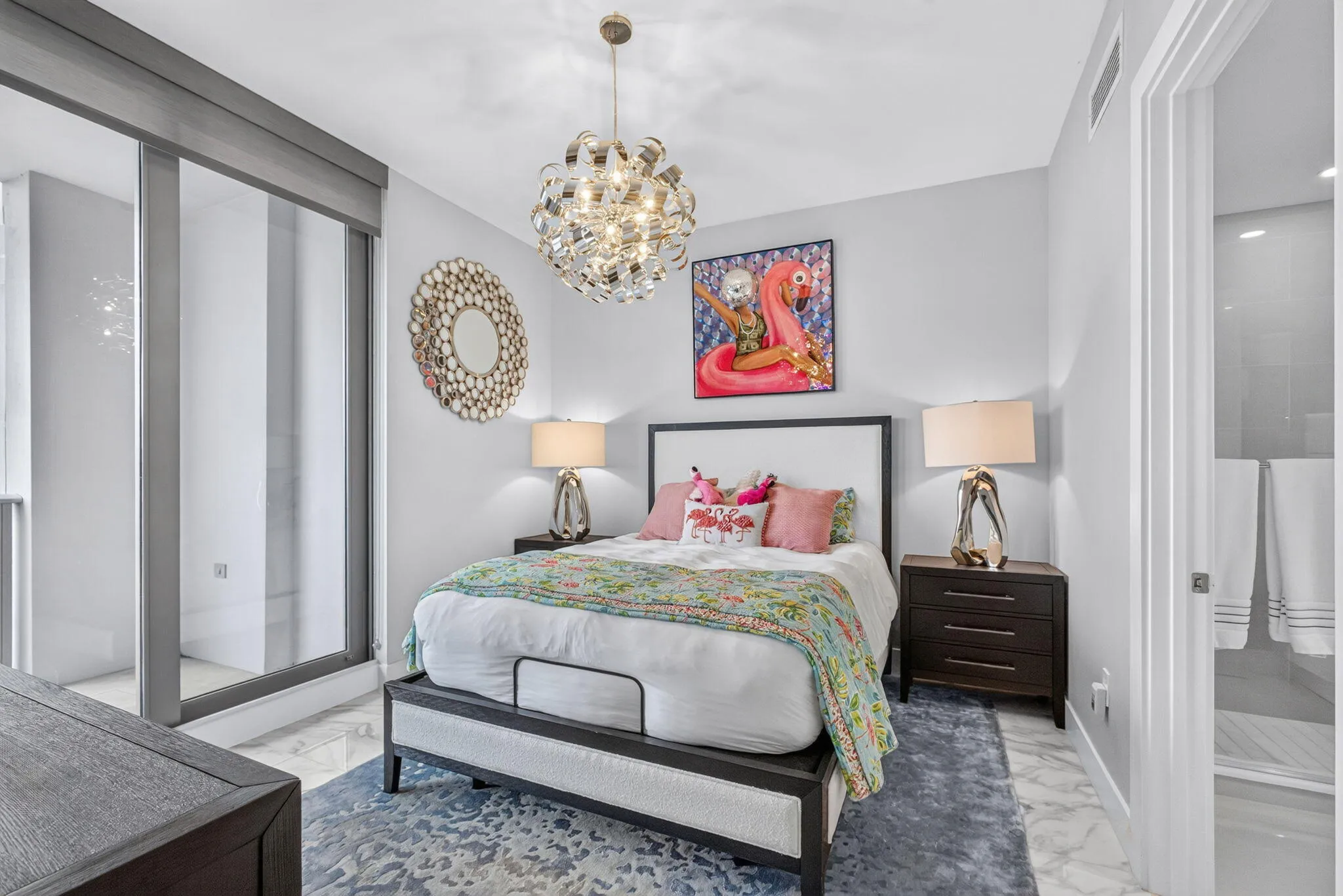 This is the Perfect Guest Room with an ensuite bathroom and closet. It's so nice your guests won't want to leave!! It has sliding doors leading to a wonderful balcony. Chandelier does not convey