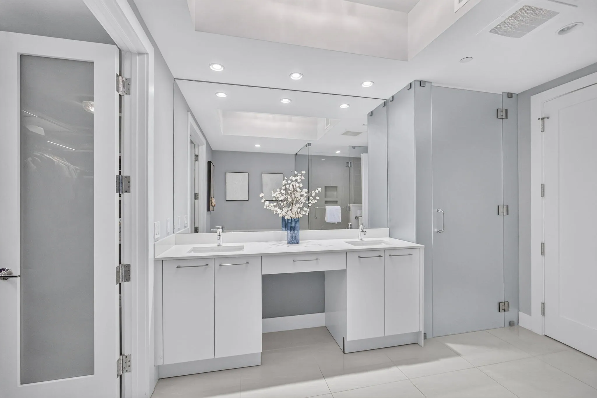 Super elegant Primary bathroom awaits you! Dual sinks a Separate shower and oversized bathtub, private toilet, terrific lighting, plenty of room for 2 people on the go! PERFECT SPOT FOR HAIR & MAKEUP SESSIONS!