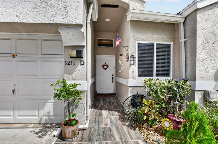 Front entry way with new Porcelain Wood Look Tiled Walkway.