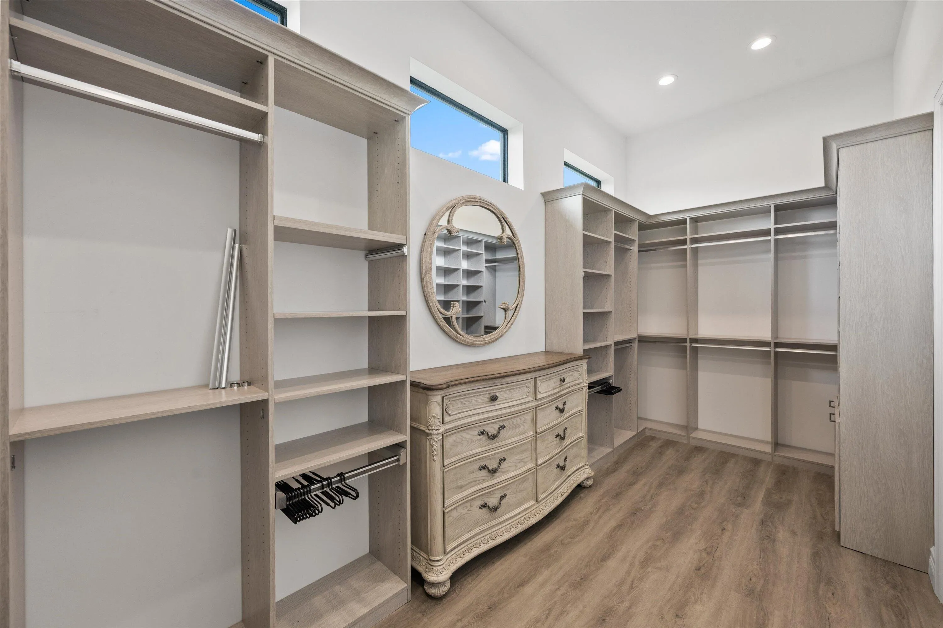 Two walk in custom primary closets