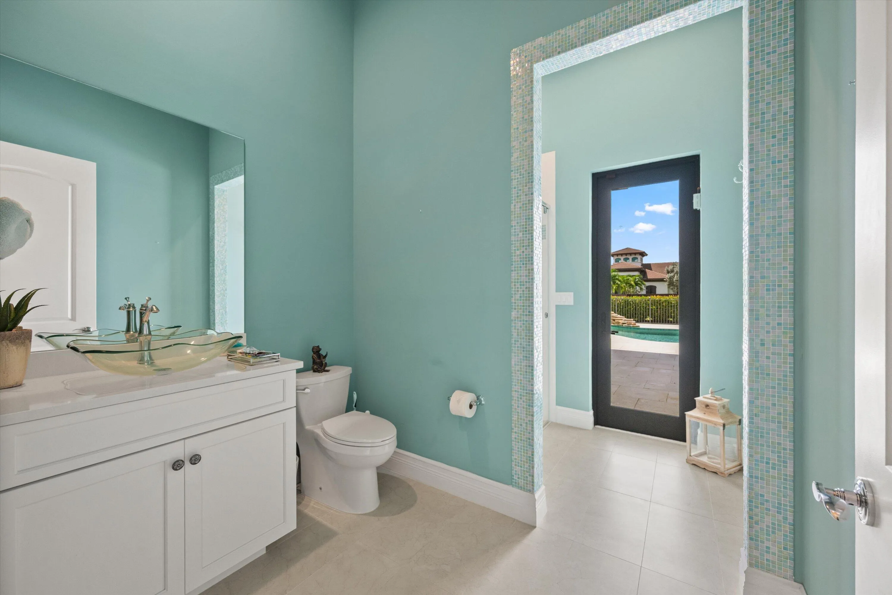 Fourth bedroom bathroom with cabana door