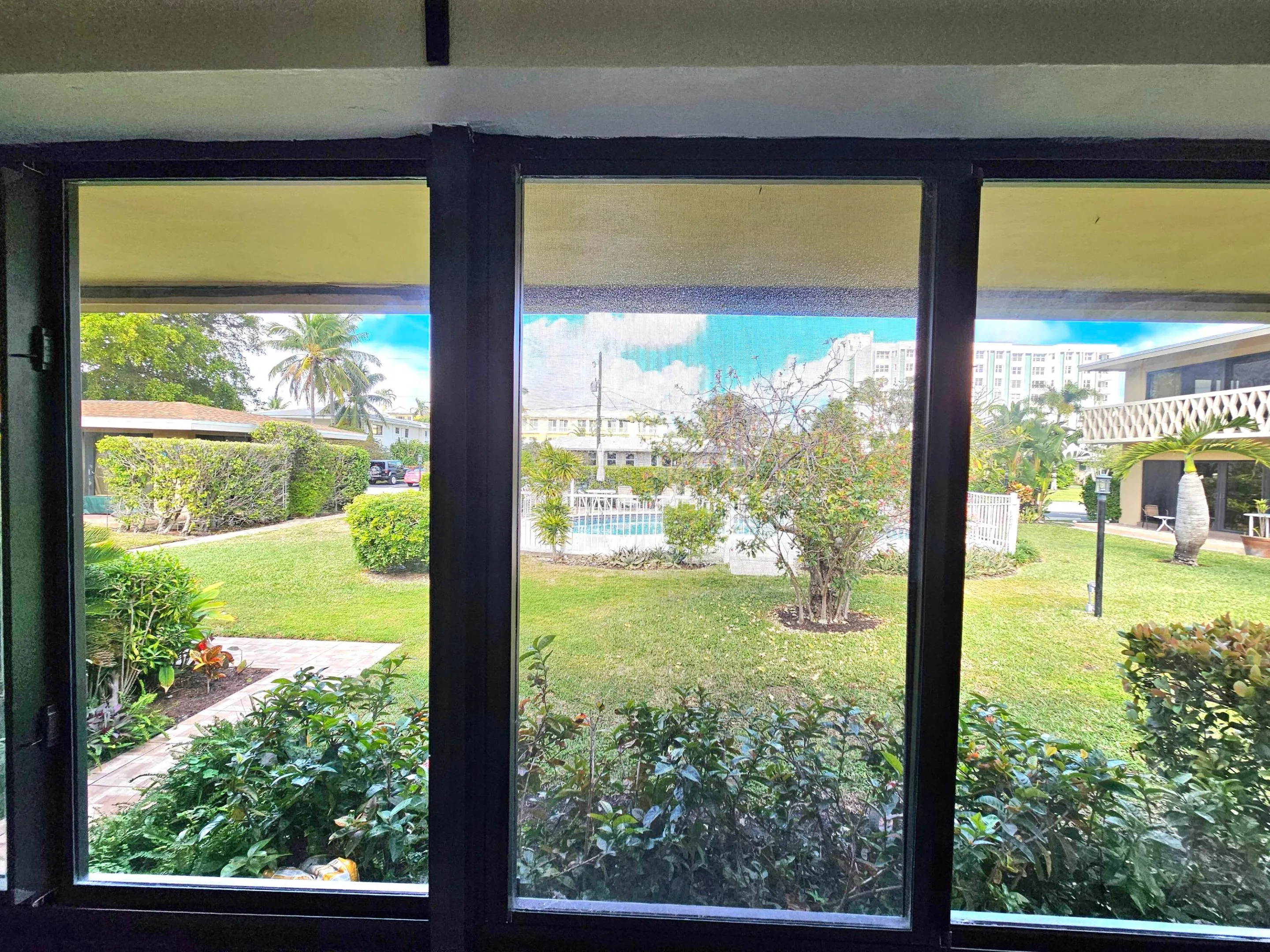 IMPACT WINDOWS WITH A VIEW OF THE POOL