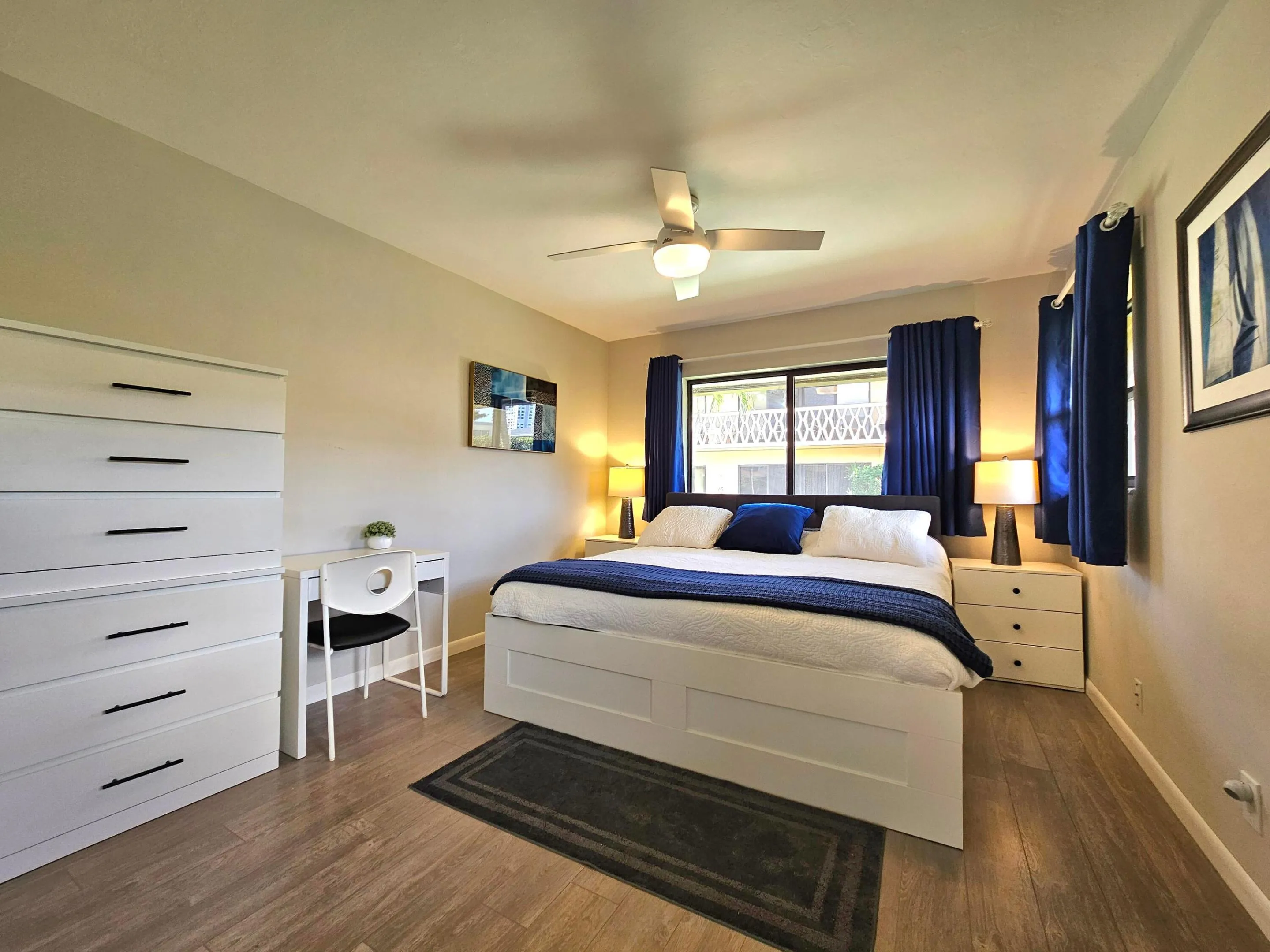 NICE SIZE BEDROOM WITH A WORK DESK SO YOU DON'T SKIP A BEAT.