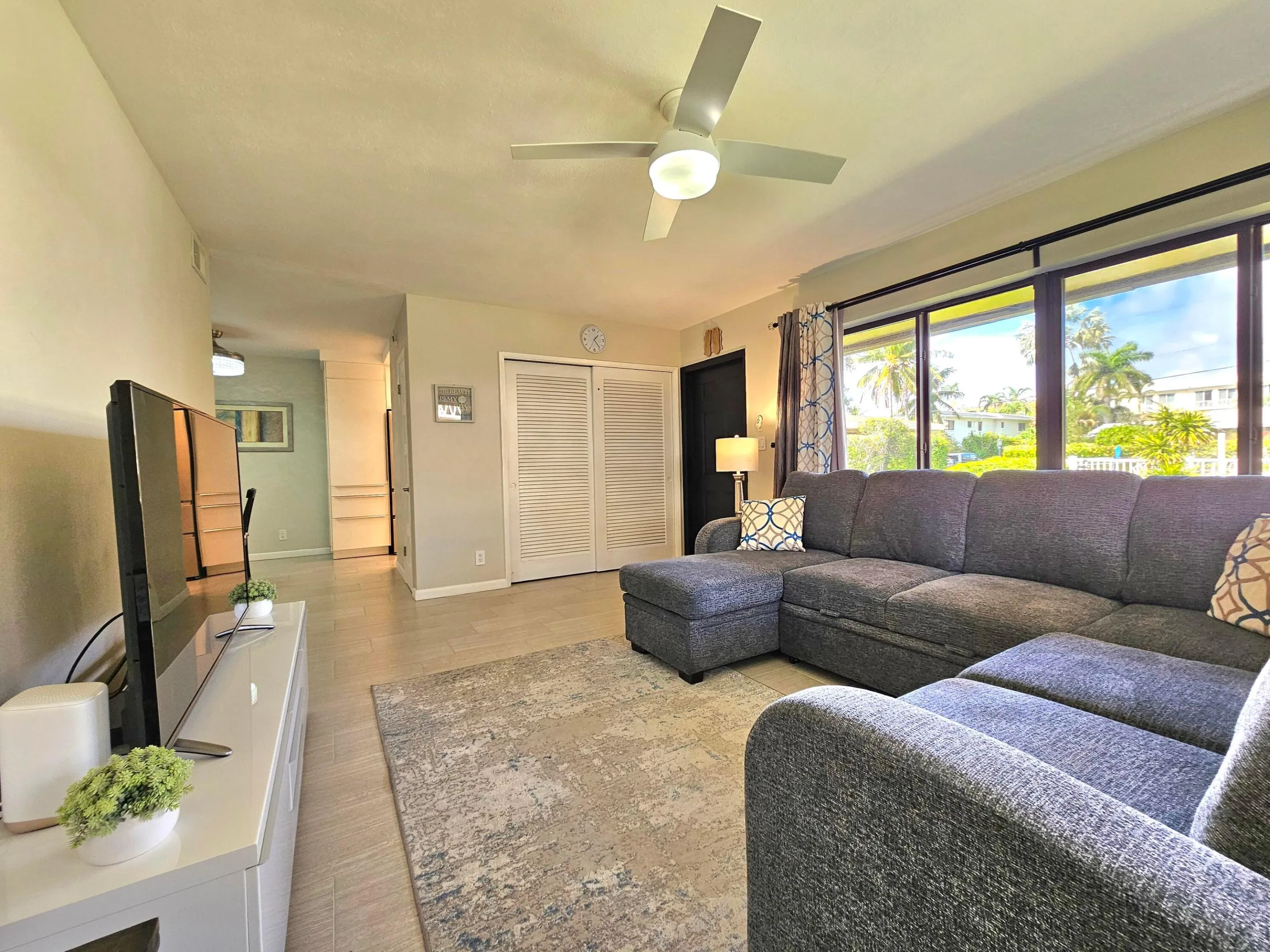 THE LIVING ROOM LEADS INTO THE DINING AREA