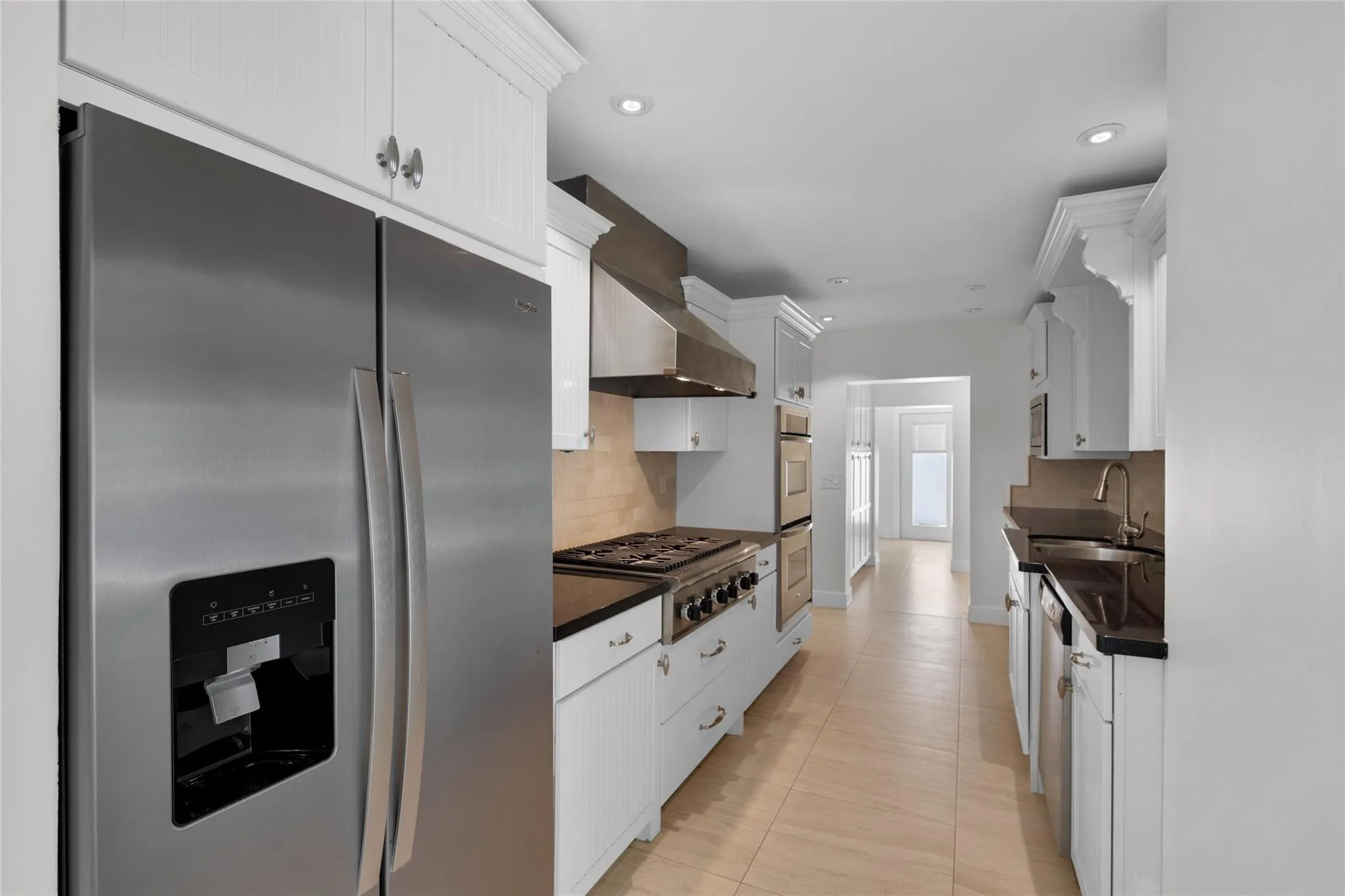 Stainless appliances and tons of storage offered in kitchen