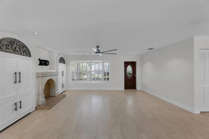 Living room offers a bay window, fireplace and great storage on each side of fireplace