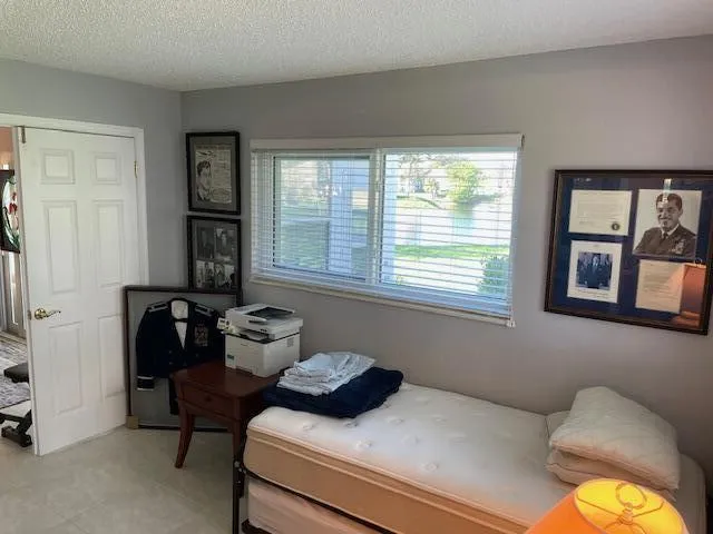 Neutral wall color with a white paneled door