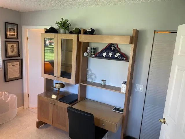 Built-in desk area with integrated shelving and cabinetry