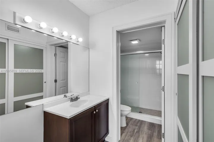 Second full bath with glass-enclosed shower