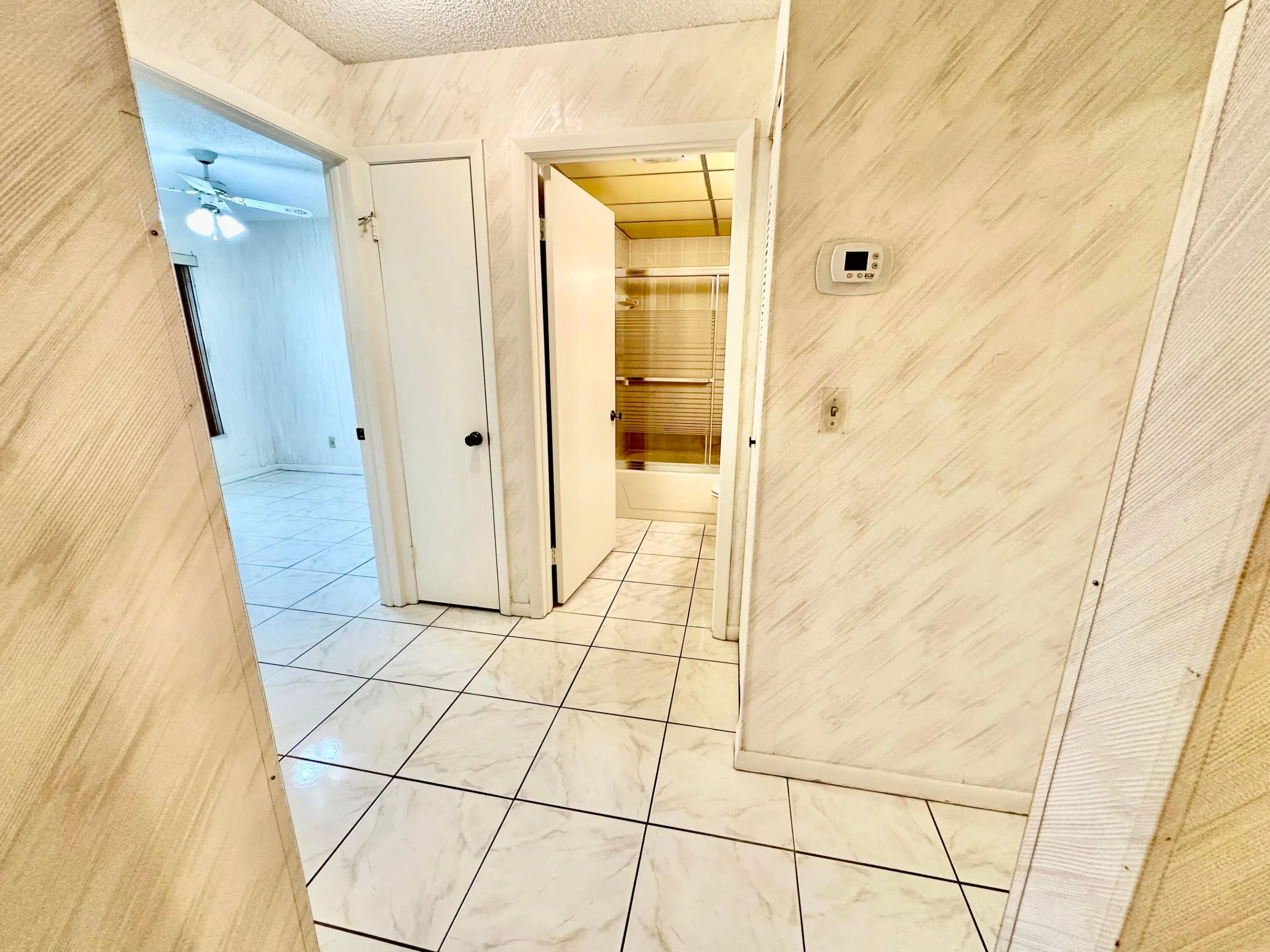 Hallway to bedrooms and bath
