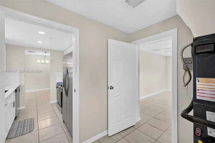 kitchen, utility rm and 4th bdrm