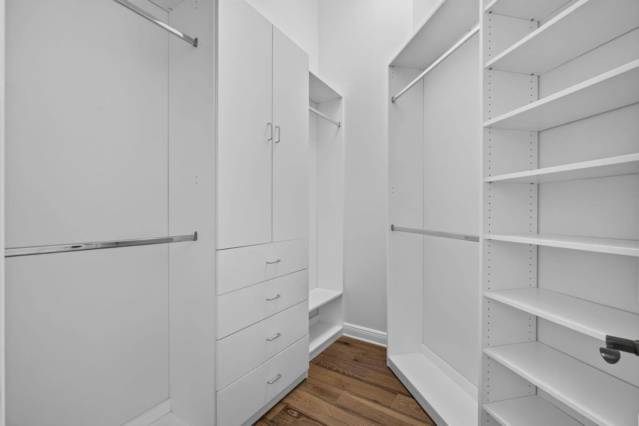 New Custom Closets in both Primary closets