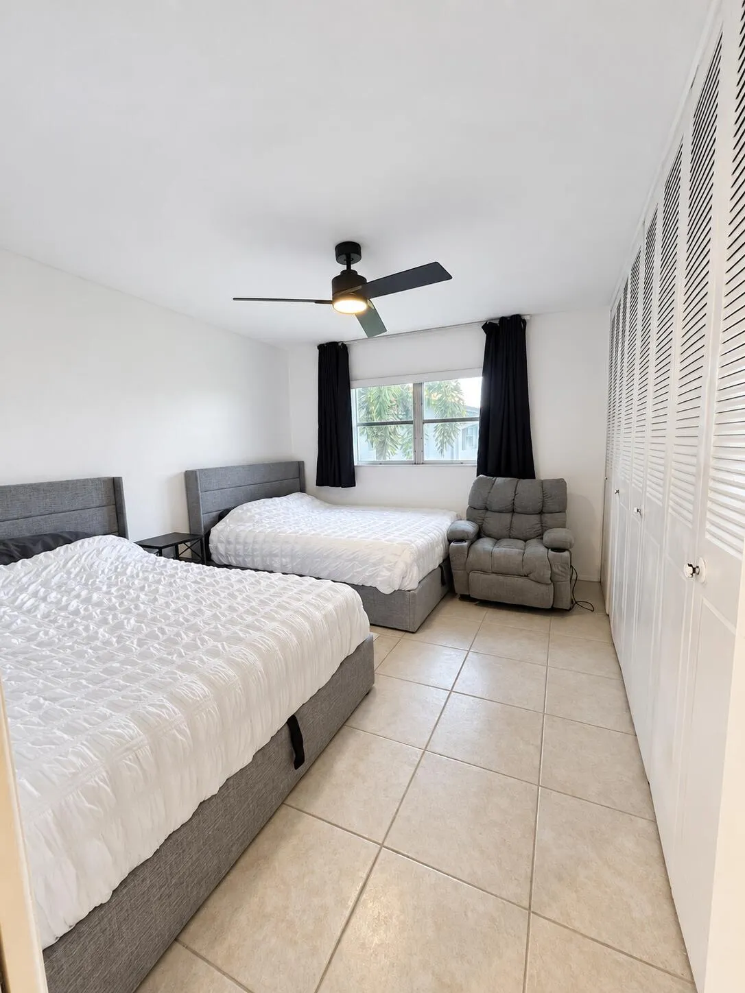 Large Master with 2 queen beds and wall to wall closet