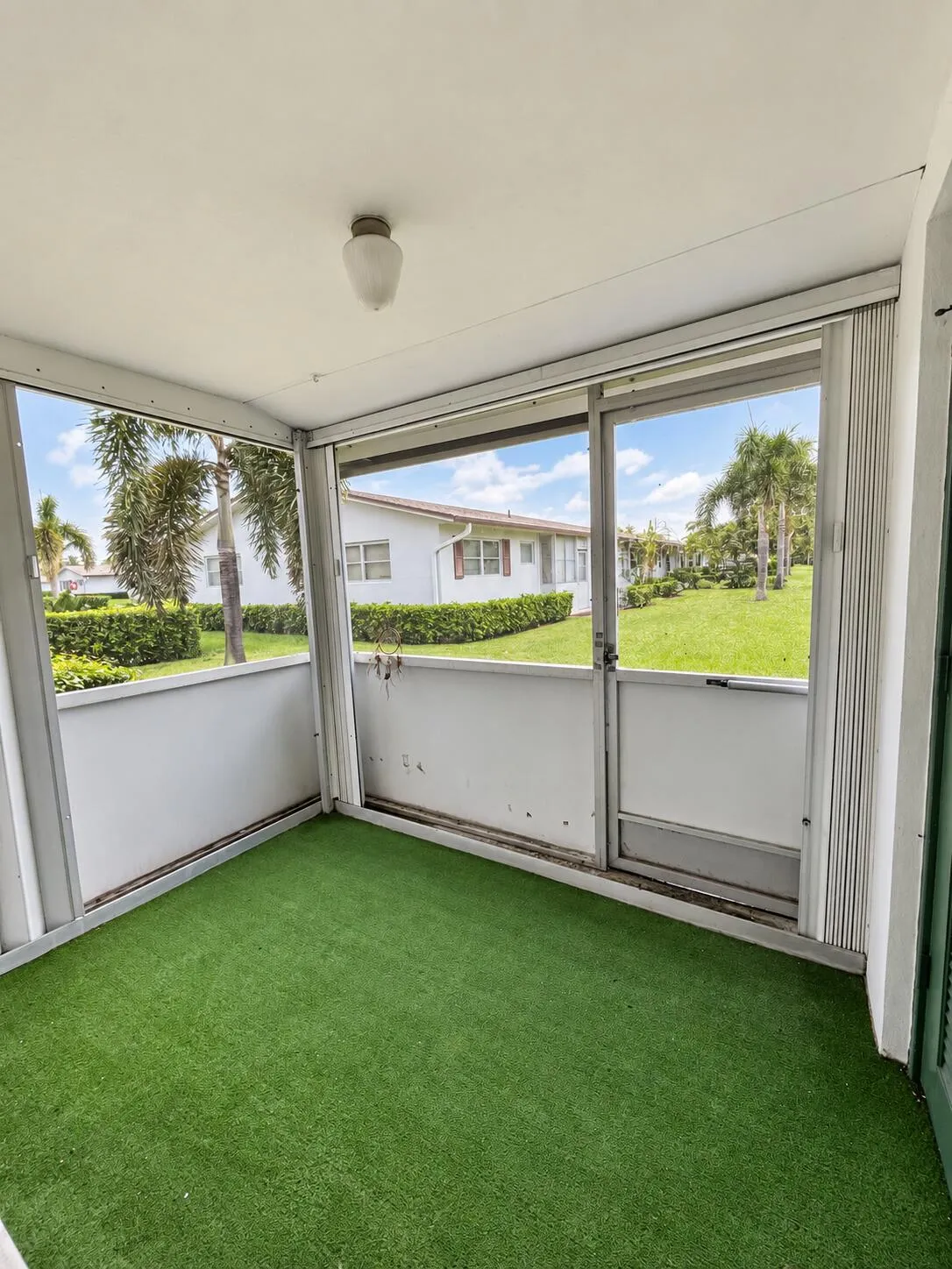Enclosed patio with accordion shutters