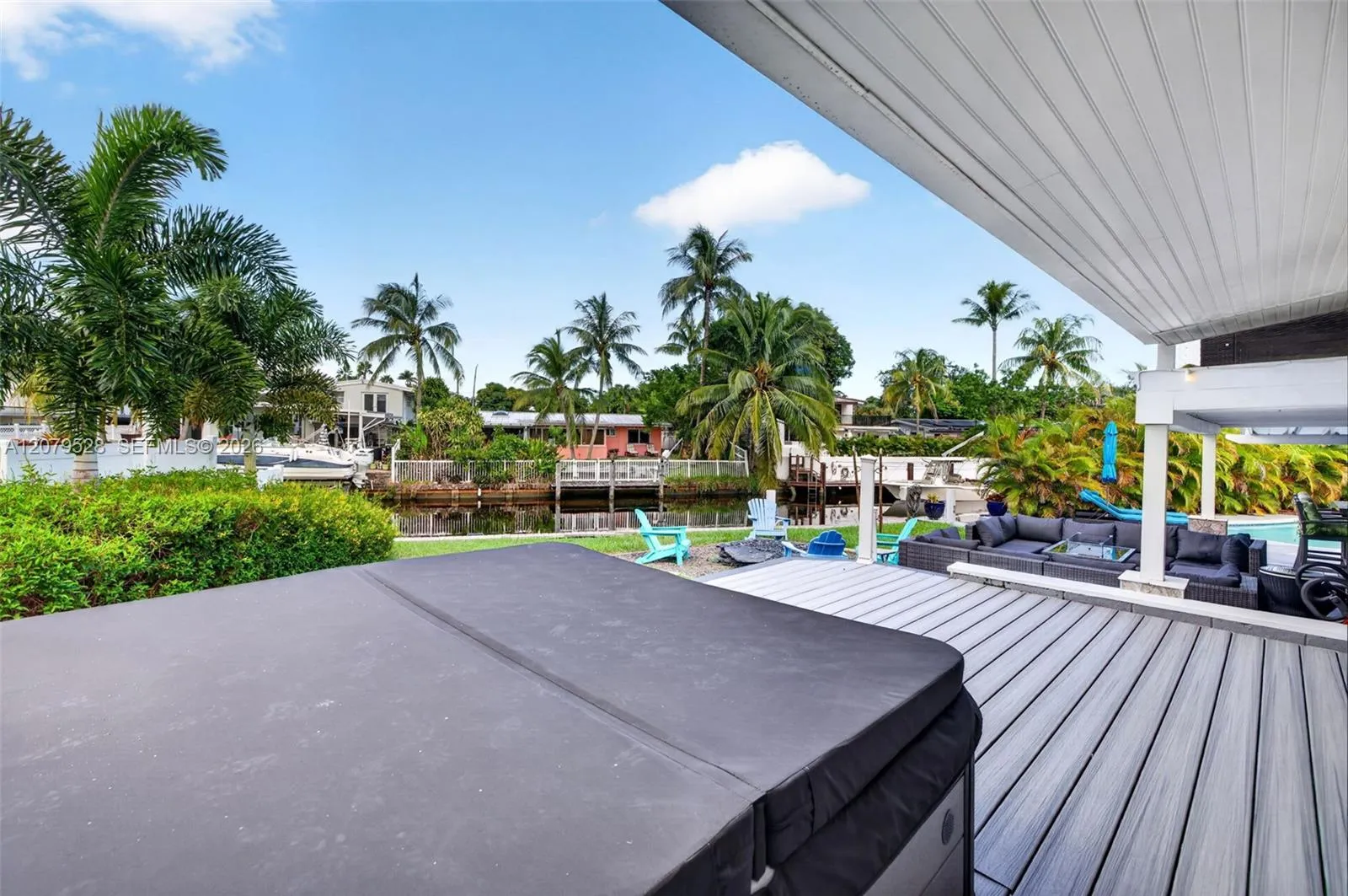 Hot Tub / Beautiful Deck surrounds pool area - upper deck leading from the Florida Room on Main Level