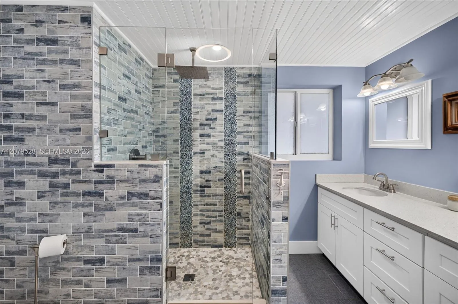 Primary Bathroom, glass shower door and tiled, dual vanity, lovely update