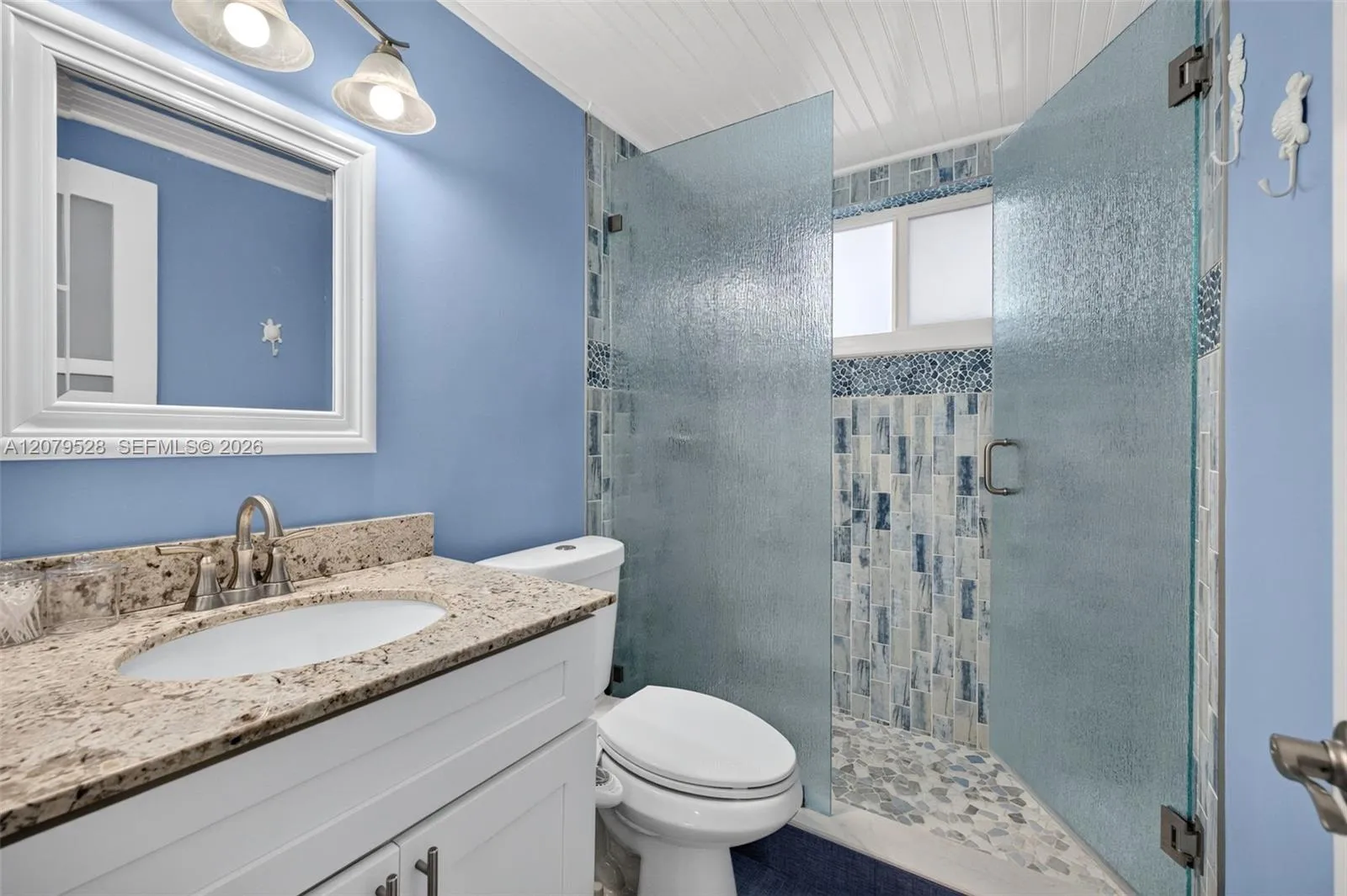 Guest bathroom on upper floor near 2 guest bedrooms - beautifully updated