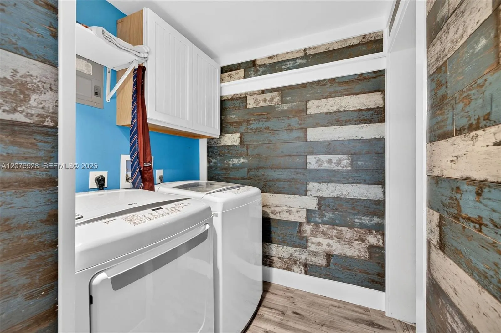 Laundry rm which leads to the downstairs bedroom