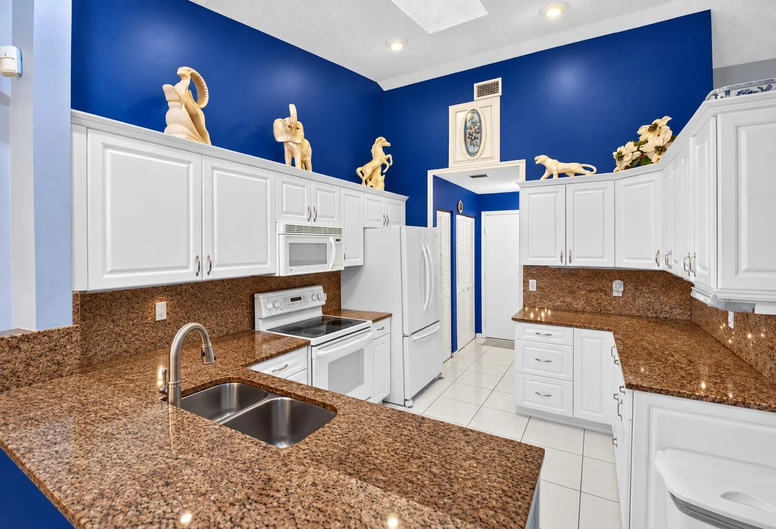 Functional kitchen with generous storage and counter space.
