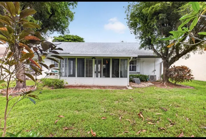 Spacious backyard with mature landscaping and room to create your own outdoor retreat.