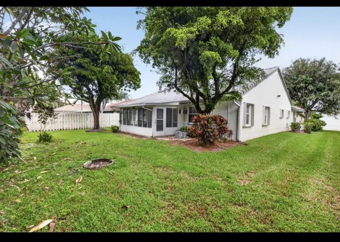 Large backyard with plenty of room for outdoor enjoyment.