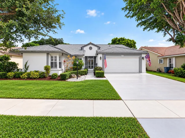 Inviting front exterior with well-maintained landscaping