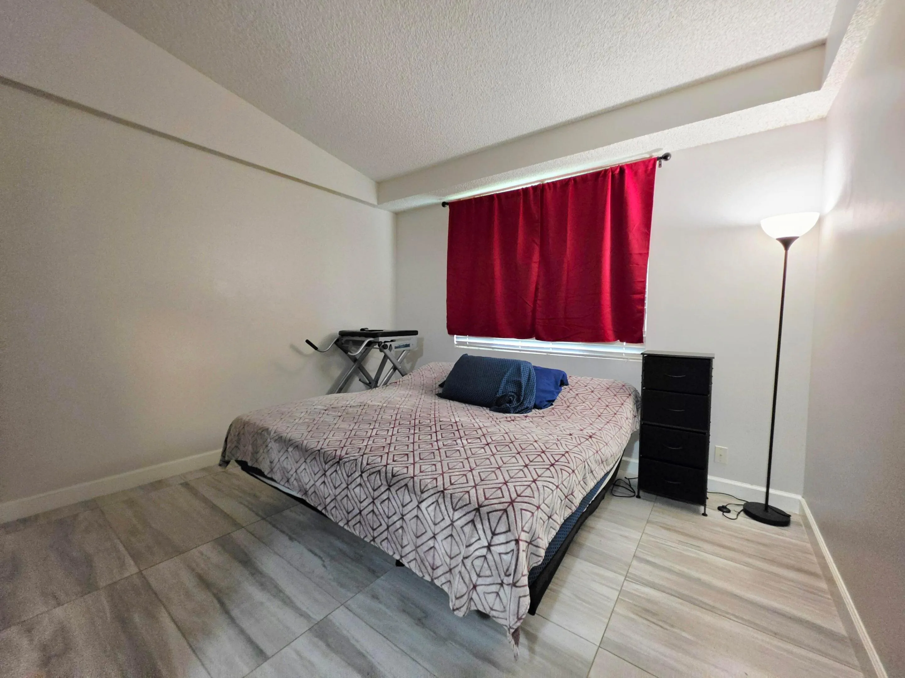THE BEDROOM IS LARGE ENOUGH FOR A KING SIZE BED & HAS A WALK-IN CLOSET